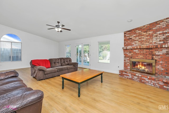 9812 Marilee Ave, Bakersfield, CA 93312 - living room with a ceiling fan, wood finished floors, a fireplace, and baseboards