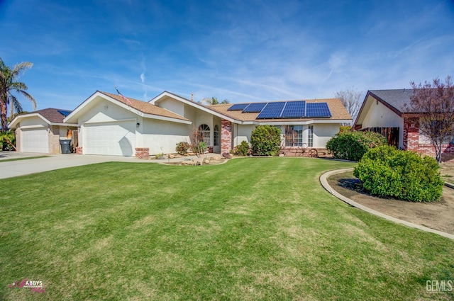9812 Marilee Ave, Bakersfield, CA 93312 - ranch-style home featuring stucco siding, a garage, solar panels, a front lawn, and concrete driveway