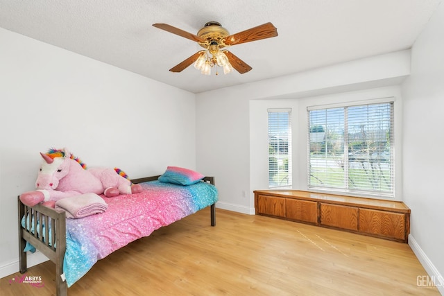 9812 Marilee Ave, Bakersfield, CA 93312 - bedroom featuring light wood-style floors, baseboards, and ceiling fan