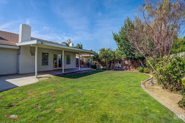 9812 Marilee Ave, Bakersfield, CA 93312 - view of yard with a patio