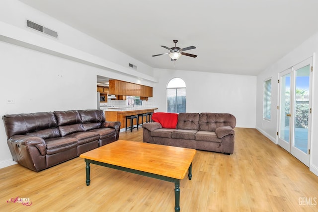 9812 Marilee Ave, Bakersfield, CA 93312 - living area with ceiling fan, light wood-style floors, and baseboards