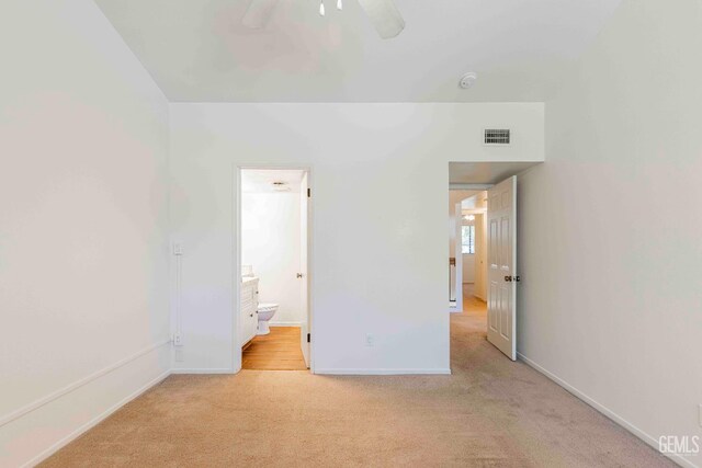 5500 Lennox Ave Unit 20, Bakersfield, CA 93309 - unfurnished bedroom featuring light carpet, ensuite bath, and ceiling fan