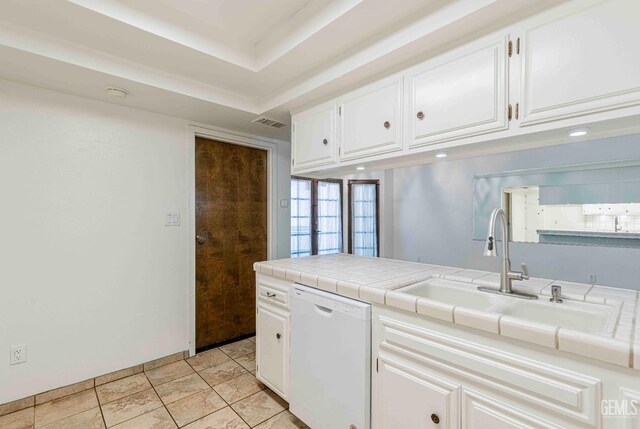 5500 Lennox Ave Unit 20, Bakersfield, CA 93309 - kitchen featuring dishwasher, white cabinets, and tile countertops