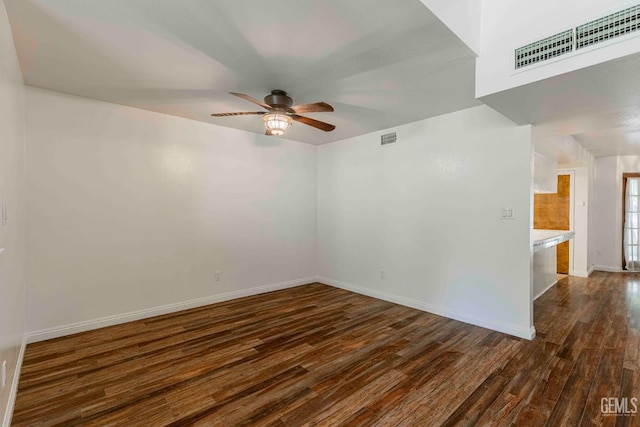 5500 Lennox Ave Unit 20, Bakersfield, CA 93309 - empty room with dark wood-style flooring and ceiling fan