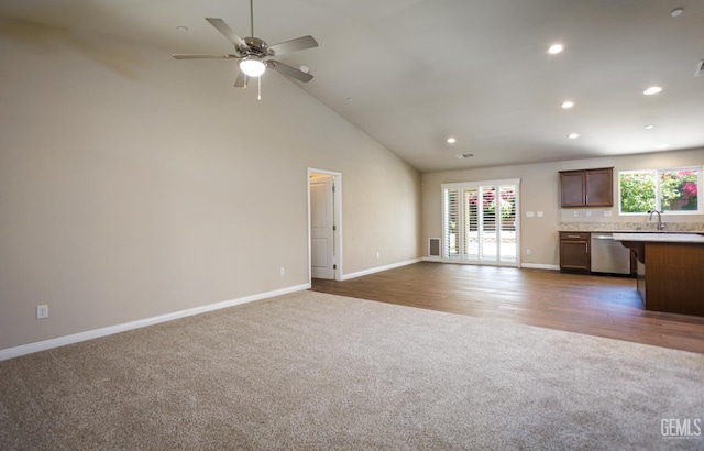 9029 Midnight Creek Way, Bakersfield, CA 93311 - unfurnished living room featuring carpet flooring, healthy amount of natural light, recessed lighting, ceiling fan, and high vaulted ceiling