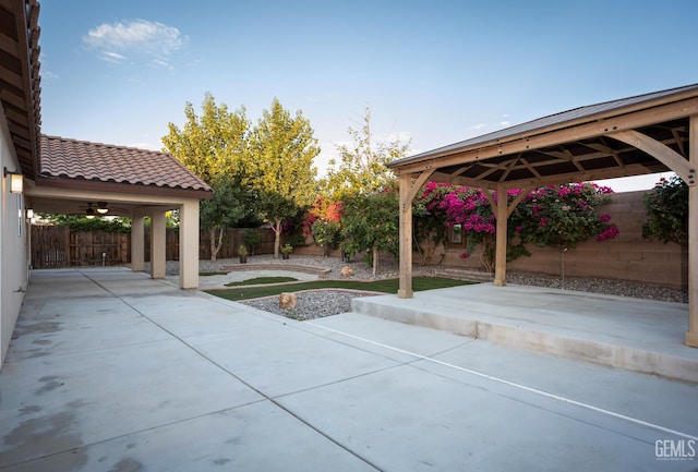 9029 Midnight Creek Way, Bakersfield, CA 93311 - fenced backyard with a gazebo and a patio area