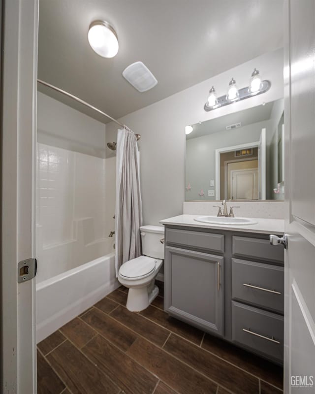 9029 Midnight Creek Way, Bakersfield, CA 93311 - bathroom featuring wood finish floors, vanity, and shower / bath combo with shower curtain