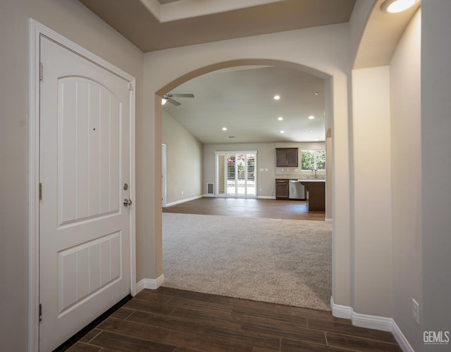 9029 Midnight Creek Way, Bakersfield, CA 93311 - foyer entrance featuring dark wood-style floors, recessed lighting, ceiling fan, and arched walkways