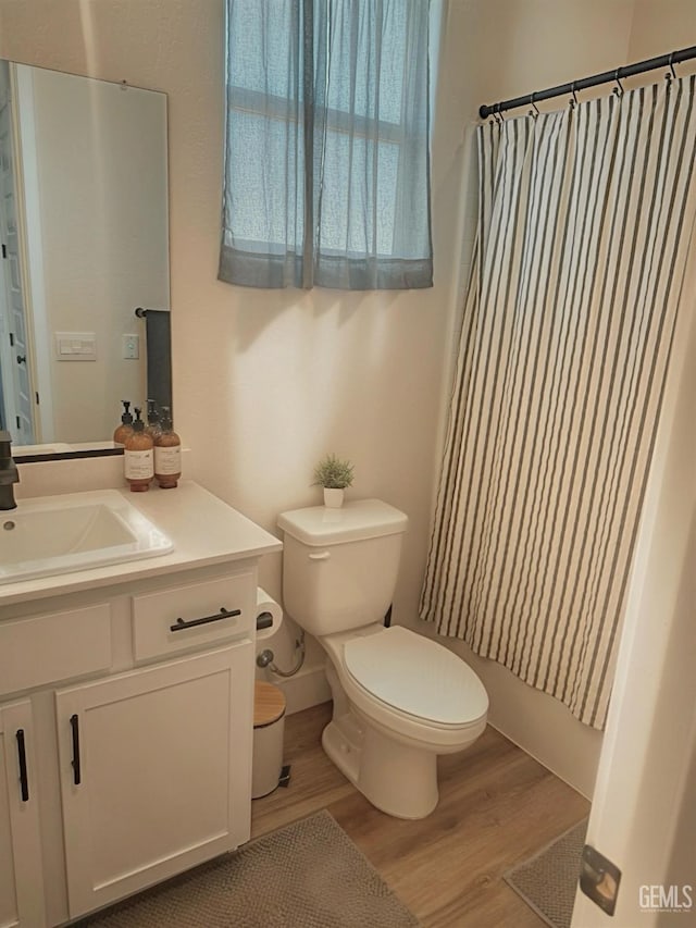 6722 Glacier Bay St, Bakersfield, CA 93313 - bathroom with wood finished floors and vanity