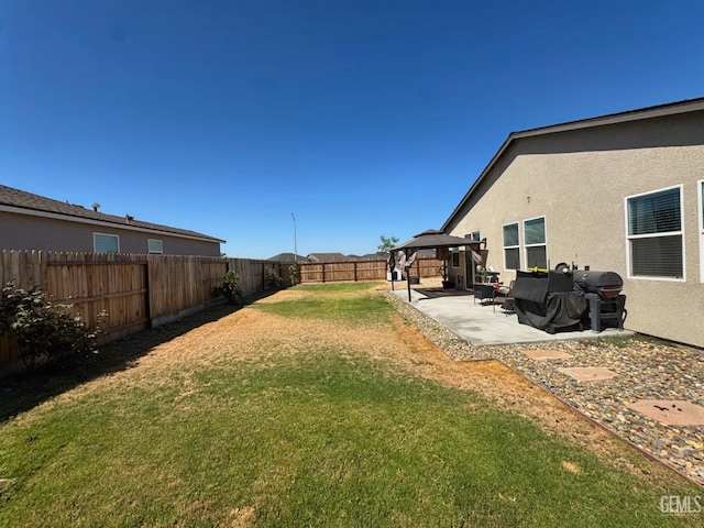 6722 Glacier Bay St, Bakersfield, CA 93313 - fenced backyard with a gazebo and a patio area