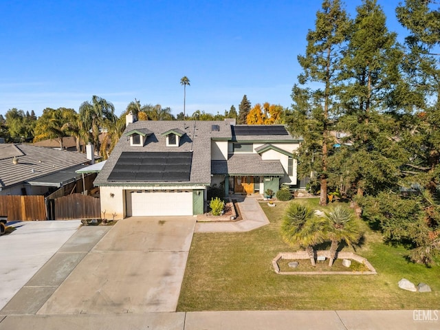 view of front facade featuring a front lawn and solar panels