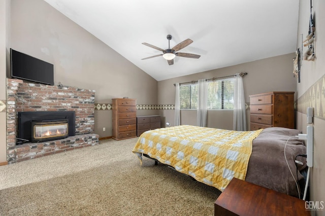 bedroom with ceiling fan, carpet floors, and vaulted ceiling