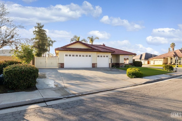 mediterranean / spanish-style house featuring a garage