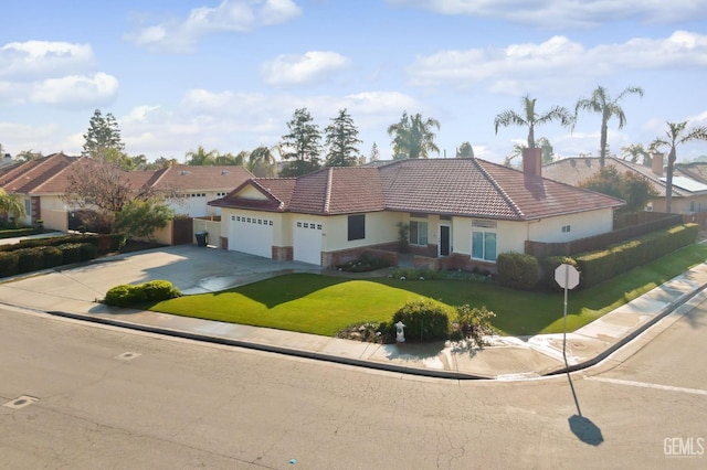 single story home with a front lawn and a garage