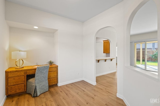 home office featuring light wood-type flooring