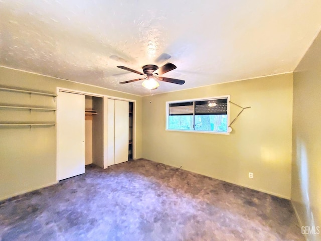 unfurnished bedroom featuring carpet and ceiling fan