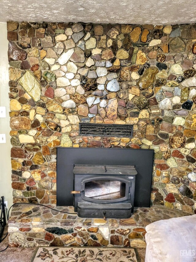room details with visible vents and a wood stove