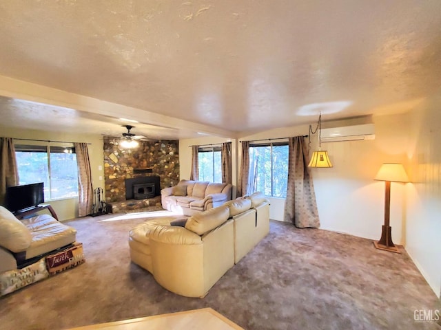 living area with a wall mounted air conditioner, a ceiling fan, a wood stove, and carpet
