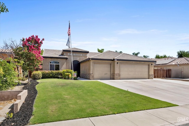 9510 Midnight Creek Way, Bakersfield, CA 93311 - view of front of property featuring driveway, an attached garage, stucco siding, and stone siding