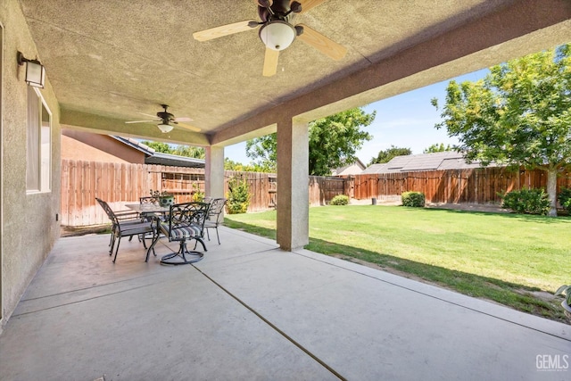 9510 Midnight Creek Way, Bakersfield, CA 93311 - fenced backyard featuring a ceiling fan, a patio area, and outdoor dining area