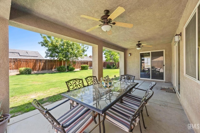 9510 Midnight Creek Way, Bakersfield, CA 93311 - fenced backyard featuring outdoor dining area, a patio, and a ceiling fan