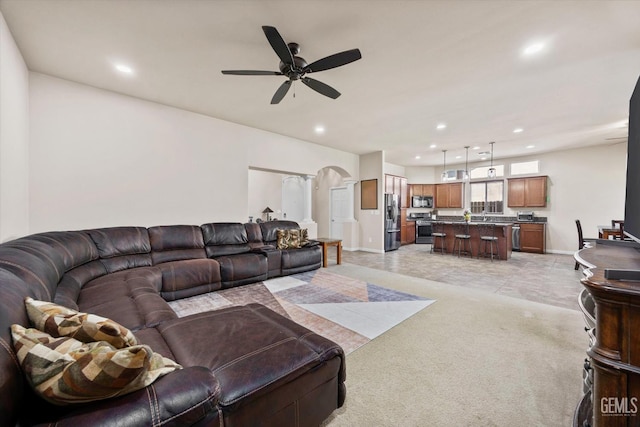 9510 Midnight Creek Way, Bakersfield, CA 93311 - living room with recessed lighting, a ceiling fan, and arched walkways