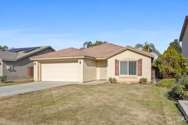 view of front facade with a front yard and a garage