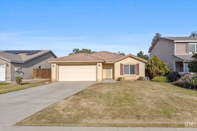 view of front facade featuring a front lawn and a garage