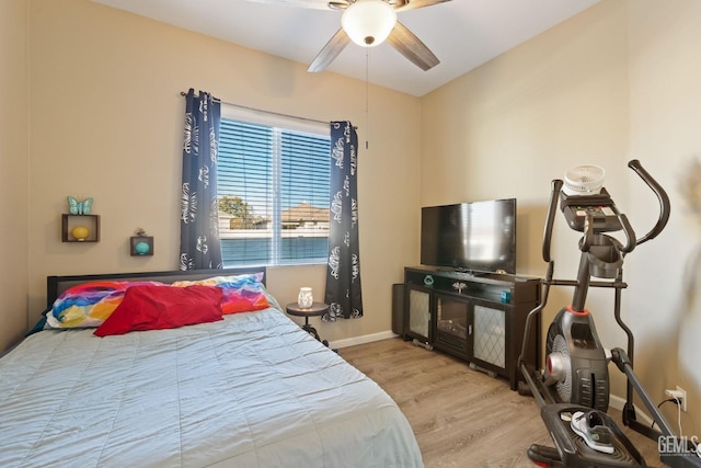 bedroom featuring ceiling fan and light hardwood / wood-style flooring