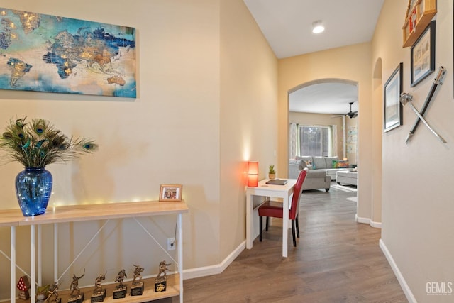 corridor featuring hardwood / wood-style floors