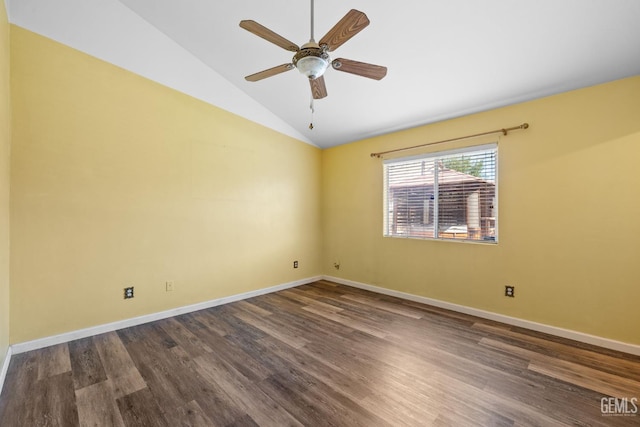5414 Tyner Ln, Bakersfield, CA 93307 - spare room featuring vaulted ceiling, dark wood-style flooring, baseboards, and a ceiling fan