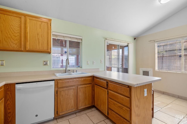 5414 Tyner Ln, Bakersfield, CA 93307 - kitchen with white dishwasher, a sink, a peninsula, light tile patterned flooring, and light countertops