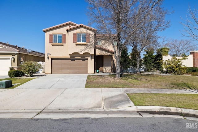 view of front of home with a tile roof, stucco siding, a front yard, a garage, and driveway