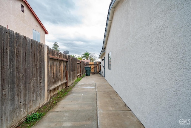 view of property exterior featuring a patio