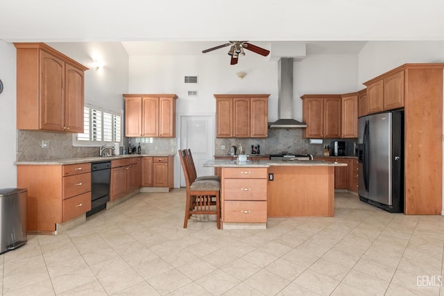 kitchen featuring black dishwasher, a kitchen breakfast bar, a center island, stainless steel fridge with ice dispenser, and wall chimney range hood