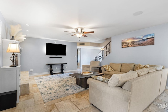 living room featuring ceiling fan