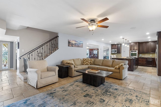 living room featuring ceiling fan