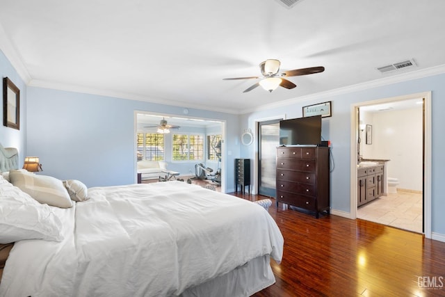 bedroom with ceiling fan, light hardwood / wood-style floors, ornamental molding, and ensuite bathroom