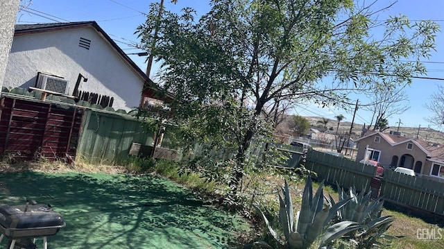 view of yard featuring fence