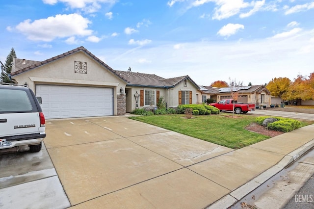 ranch-style house with a garage and a front lawn