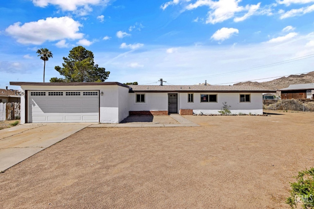 ranch-style house with a garage