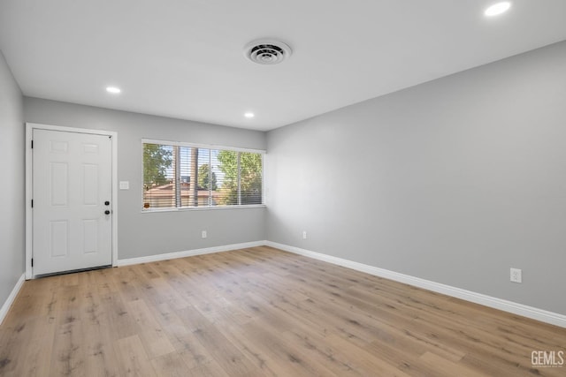 2848 Summit Cir, Bakersfield, CA 93306 - foyer with baseboards, light wood-style floors, and recessed lighting