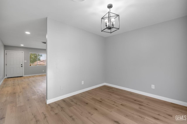 2848 Summit Cir, Bakersfield, CA 93306 - unfurnished dining area featuring light wood-type flooring, a chandelier, recessed lighting, and baseboards
