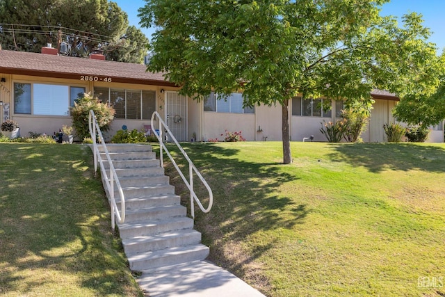 2848 Summit Cir, Bakersfield, CA 93306 - ranch-style home with a front lawn and a chimney