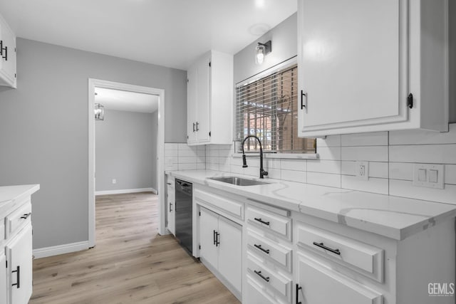 2848 Summit Cir, Bakersfield, CA 93306 - kitchen featuring a sink, dishwasher, white cabinets, tasteful backsplash, and baseboards