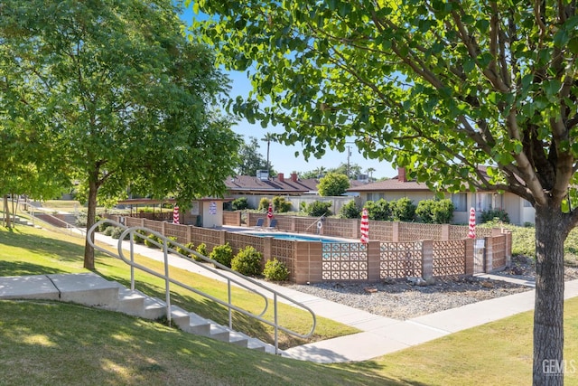 2848 Summit Cir, Bakersfield, CA 93306 - view of home's community with a pool