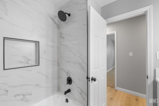 2848 Summit Cir, Bakersfield, CA 93306 - bathroom with wood finished floors, shower / bathtub combination, and baseboards