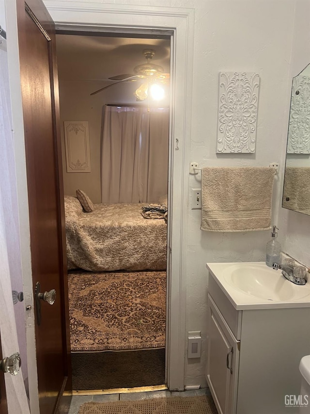 bathroom with tile patterned floors and vanity