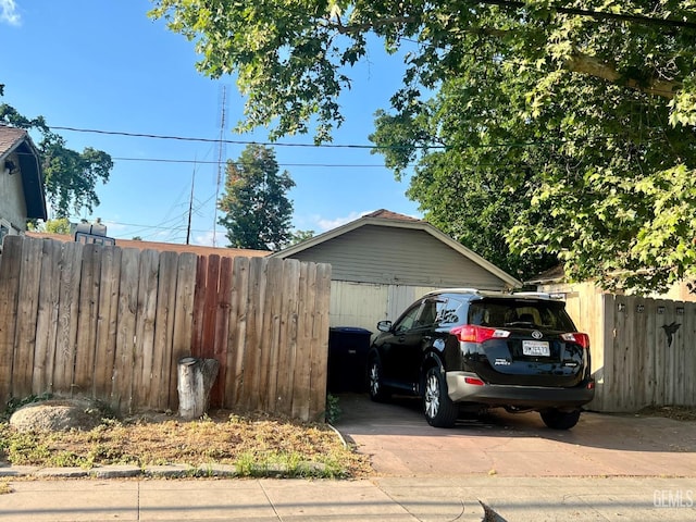 garage with fence
