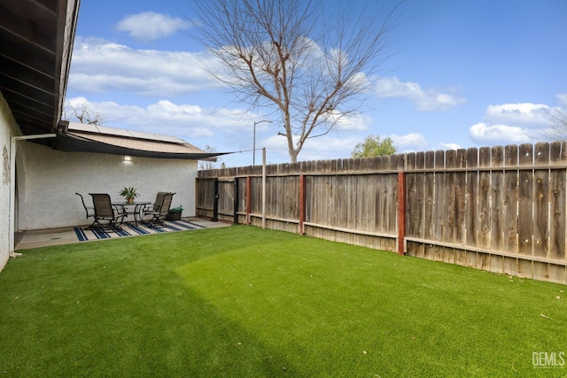 view of yard with a patio area